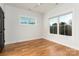 Bright bedroom with natural light and hardwood floors at 106 Isle Of Pines Rd, Mooresville, NC 28117
