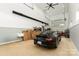 Spacious garage showcasing a modern black car and lots of storage space at 106 Isle Of Pines Rd, Mooresville, NC 28117