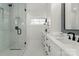 Light and airy bathroom with glass enclosed shower and white marble floors at 108 Isle Of Pines Rd # 3, Mooresville, NC 28117