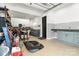Garage features storage and counter space with a sink for cleaning or other projects at 108 Isle Of Pines Rd # 3, Mooresville, NC 28117