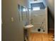 This bathroom includes a shower-tub combination and pedestal sink at 13062 Highway 55 W Hwy, York, SC 29745