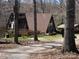 Unique A-frame house nestled among trees, offering a peaceful retreat with rustic charm and ample outdoor space at 13062 Highway 55 W Hwy, York, SC 29745