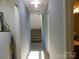 Hallway leading to stairs features a water heater and access to other areas of the home at 13062 Highway 55 W Hwy, York, SC 29745