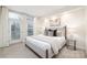 Bright bedroom with natural light, a comfortable bed, and stylish decor for a relaxing retreat at 1320 Fillmore St # 419, Charlotte, NC 28203