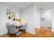 Bright dining area featuring a modern round table, seating for four, and tasteful wall decor at 1320 Fillmore St # 419, Charlotte, NC 28203