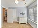 Another bedroom with carpet flooring, closet, dresser and a window for natural light at 13424 Portside Ct, Charlotte, NC 28278