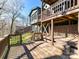 Multi-level wood deck with wooded lot at 13424 Portside Ct, Charlotte, NC 28278