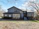 Charming two-story home featuring a stone facade and professionally landscaped front yard at 13424 Portside Ct, Charlotte, NC 28278