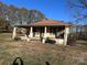 Charming single-story home featuring a classic covered front porch and ample natural light at 1415 S Morgan St, Shelby, NC 28152
