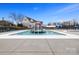 Relaxing community pool area featuring water features for younger children and lounge seating at 1432 Astoria Nw Ln, Concord, NC 28027