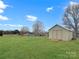 Spacious backyard with a large shed, providing ample storage and room for outdoor activities at 1465 Earl St, Hickory, NC 28602