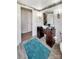Bathroom with white wainscoting, wood-look floors, and a vanity with a vessel sink at 1465 Earl St, Hickory, NC 28602