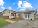 Charming home with brick facade, complemented by manicured lawn and inviting walkway at 1465 Earl St, Hickory, NC 28602