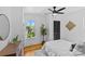 Serene bedroom with hardwood floors, tree view, and a ceiling fan at 1517 Cleveland Ave # D, Charlotte, NC 28203