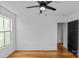 Bright bedroom features a modern ceiling fan, natural light, and hardwood floors at 1517 Cleveland Ave # D, Charlotte, NC 28203