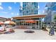Jeni's Ice Creams exterior showcases its inviting storefront with colorful umbrellas and signage, offering a delightful treat experience at 1517 Cleveland Ave # D, Charlotte, NC 28203