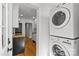 Bright laundry area with a stacked washer and dryer, with direct access to the kitchen at 1517 Cleveland Ave # D, Charlotte, NC 28203