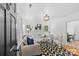 Bright living room featuring white walls, fireplace, modern furniture, and a stylish patterned rug at 1517 Cleveland Ave # D, Charlotte, NC 28203
