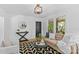 Inviting living room area featuring hardwood floors, a decorative fireplace, and neutral furnishings at 1517 Cleveland Ave # D, Charlotte, NC 28203