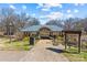 Picturesque park pavilion with a shaded seating area, surrounded by lush greenery and walking paths at 1517 Cleveland Ave # D, Charlotte, NC 28203