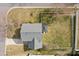 Overhead view of a home with gray roof, patio, and a fenced backyard with fire pit at 166 Chere Helen Dr, Mooresville, NC 28115