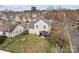Backyard featuring a patio, fire pit, manicured lawn, partial fence, and mature trees at 166 Chere Helen Dr, Mooresville, NC 28115