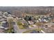 Residential neighborhood featuring two-story homes, mature trees, and a tranquil pond at 166 Chere Helen Dr, Mooresville, NC 28115