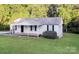 Charming single-story home featuring a covered front porch and well-maintained lawn at 19 Church St, York, SC 29745
