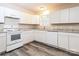 Bright kitchen featuring granite countertops and modern appliances at 19 Church St, York, SC 29745