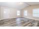 Bright living room featuring vaulted ceiling, neutral paint, and modern floors at 19 Church St, York, SC 29745