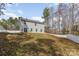 Spacious backyard featuring a two-story home and fenced perimeter at 205 Athens Dr # 31, Salisbury, NC 28147