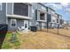 Fenced backyard with a concrete patio area, ideal for outdoor activities and entertaining at 2061 Dornoch Rd, Fort Mill, SC 29708