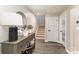 Inviting entryway with stylish console table, decorative mirror, and staircase to upper level at 2061 Dornoch Rd, Fort Mill, SC 29708