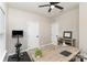 Functional home office featuring a spacious desk and exercise bike, perfect for productivity at 2061 Dornoch Rd, Fort Mill, SC 29708