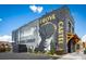 Brewery mural on a brick building with a black parking lot, offering local culture and community at 2061 Stephens Farm Dr, China Grove, NC 28023