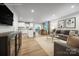 Open-concept living space showcasing kitchen, dining, and living room areas with modern finishes at 2061 Stephens Farm Dr, China Grove, NC 28023