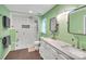 Contemporary bathroom featuring a double vanity and walk-in shower with tile surround at 2201 Holly Ln, Shelby, NC 28150