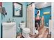 Cozy bathroom featuring wood-look floors and a sliding barn door concealing the laundry at 2201 Holly Ln, Shelby, NC 28150