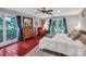 Light-filled primary bedroom with a large window and hardwood floors at 2201 Holly Ln, Shelby, NC 28150
