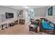 Bonus room with a large sectional couch and a large TV at 2201 Holly Ln, Shelby, NC 28150