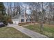 Well-maintained home with a two-car garage and long driveway at 2201 Holly Ln, Shelby, NC 28150