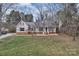 Charming two-story home with neutral siding and welcoming front porch at 2201 Holly Ln, Shelby, NC 28150