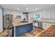 Bright kitchen with stainless steel appliances, white cabinets, and a stylish island at 2201 Holly Ln, Shelby, NC 28150