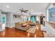 Inviting living room featuring hardwood floors, neutral paint, fireplace, and natural light at 2201 Holly Ln, Shelby, NC 28150