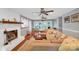 Spacious living room featuring a fireplace, hardwood floors, and plenty of natural light at 2201 Holly Ln, Shelby, NC 28150