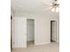 Bright bedroom features neutral walls, carpeted floors, ceiling fan, and closet at 221 Chicago Ln, York, SC 29745