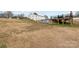 Expansive backyard with a pool and deck area, offering plenty of space for outdoor activities at 24253 Old Aquadale Rd, Albemarle, NC 28001