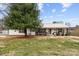 Charming single-story home featuring a metal roof and rocking chair front porch at 24253 Old Aquadale Rd, Albemarle, NC 28001