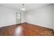 Bright living room with hardwood floors and ample natural light from door to backyard at 259 Unionville Indian Trail W Rd, Indian Trail, NC 28079