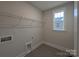 Practical laundry room with shelving and a window for natural light at 283 Luray Way # 449, Rock Hill, SC 29730